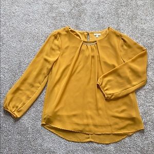 Yellow blouse.